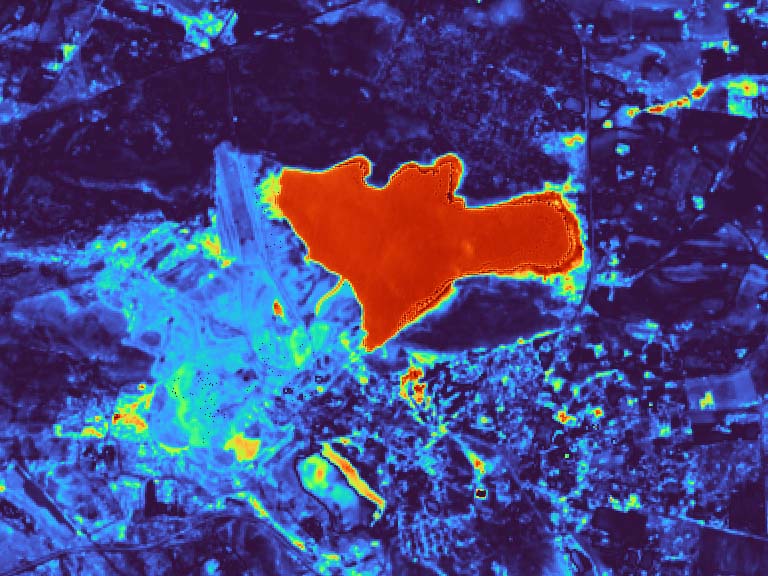 Soil moisture image of a mine tailings facility using the OPTRAM algorithm.
