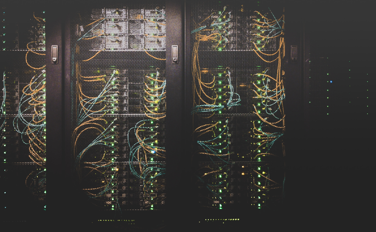 A bank of servers with yellow cables