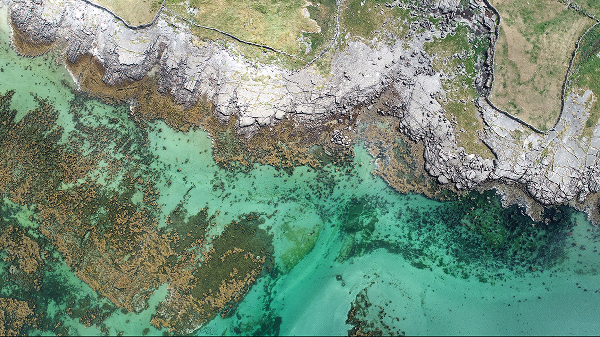 an aerial view of the rocky coast of Inishmore